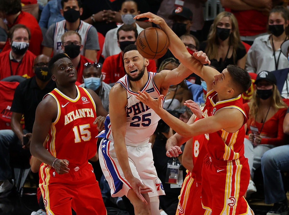 Ben Simmons of the Philadelphia 76ers battles for a rebound against the Atlanta Hawks.