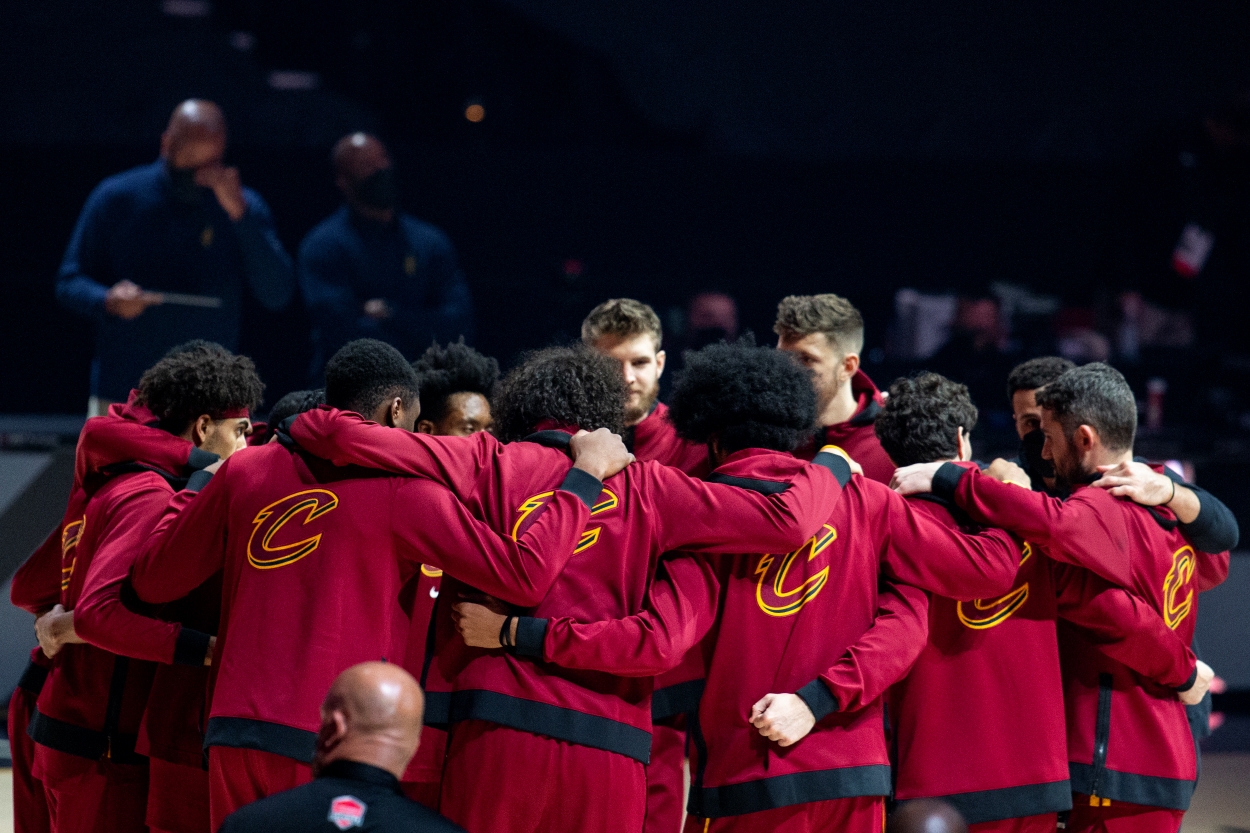 The Cleveland Cavaliers roster huddles before the start of their home game against the Portland Trail Blazers at Rocket Mortgage Fieldhouse.