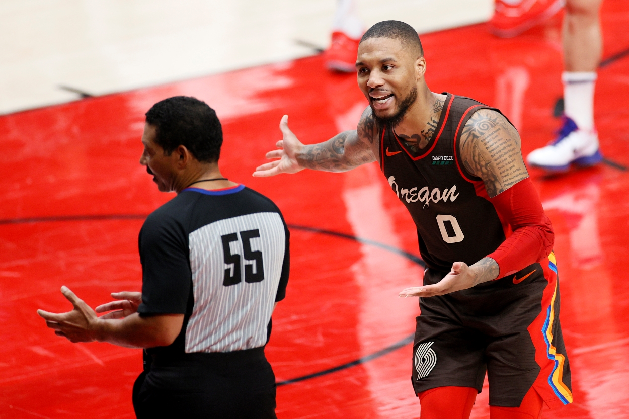 Damian Lillard of the Portland Trail Blazers reacts toward the official in the second quarter of a game against the Denver Nuggets during the 2021 NBA Playoffs.