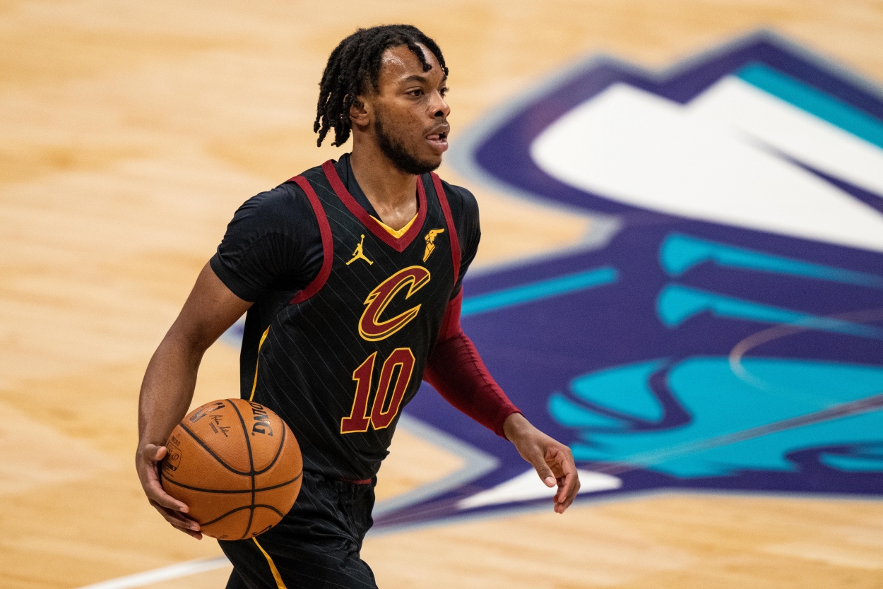 Darius Garland of the Cleveland Cavaliers, who drafted Evan Mobley third overall in the 2021 draft, brings the ball up court a game against the Charlotte Hornets last season.