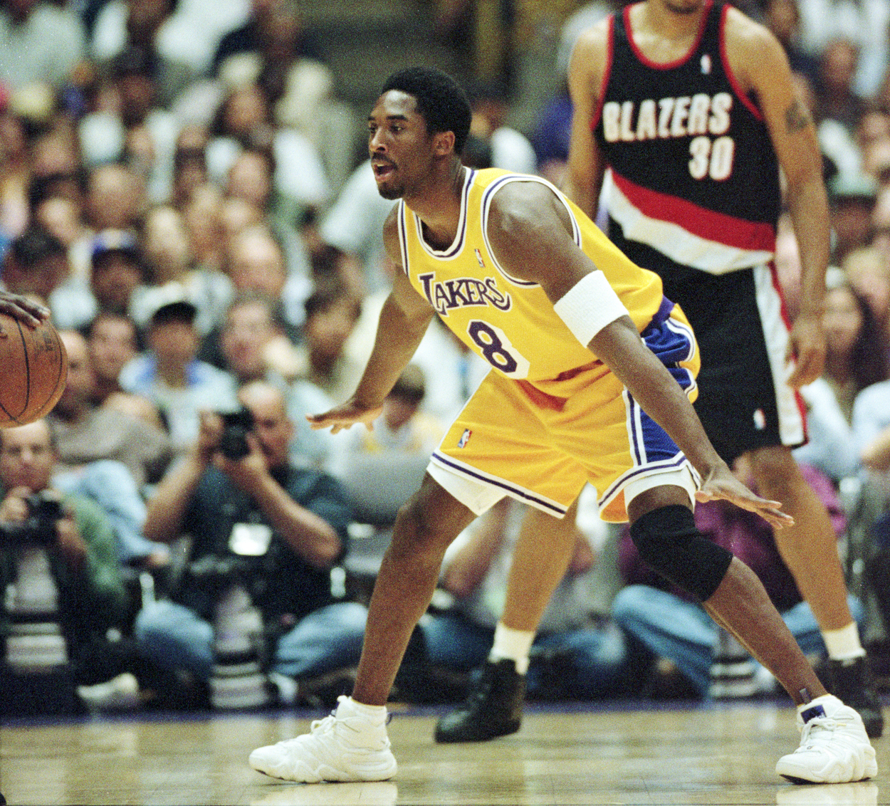 Kobe Bryant gets ready to guard the Portland Trail Blazers.