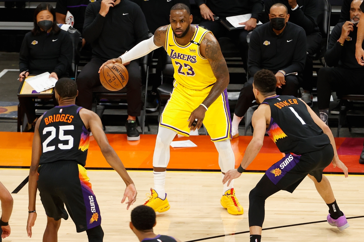 LeBron James of the Los Angeles Lakers handles the ball during a playoff matchup against the Phoenix Suns.