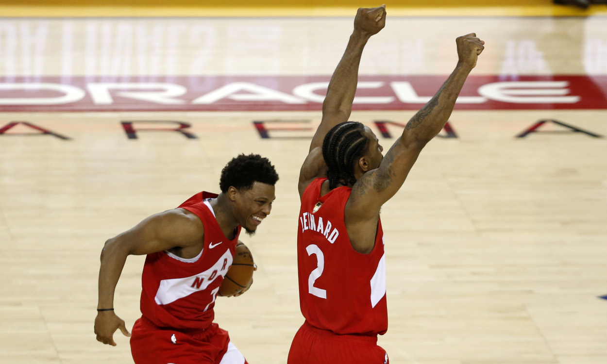 Kyle Lowry and Kawhi Leonard celebrate a Game 6 victory to clinch the Toronto Raptors' first NBA championship in 2019
