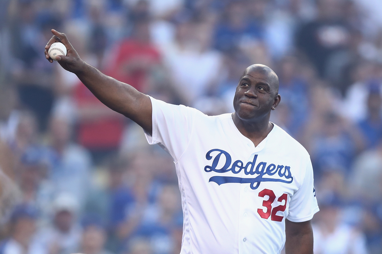 Magic Johnson throwing the first pitch at a Los Angeles Dodgers game.