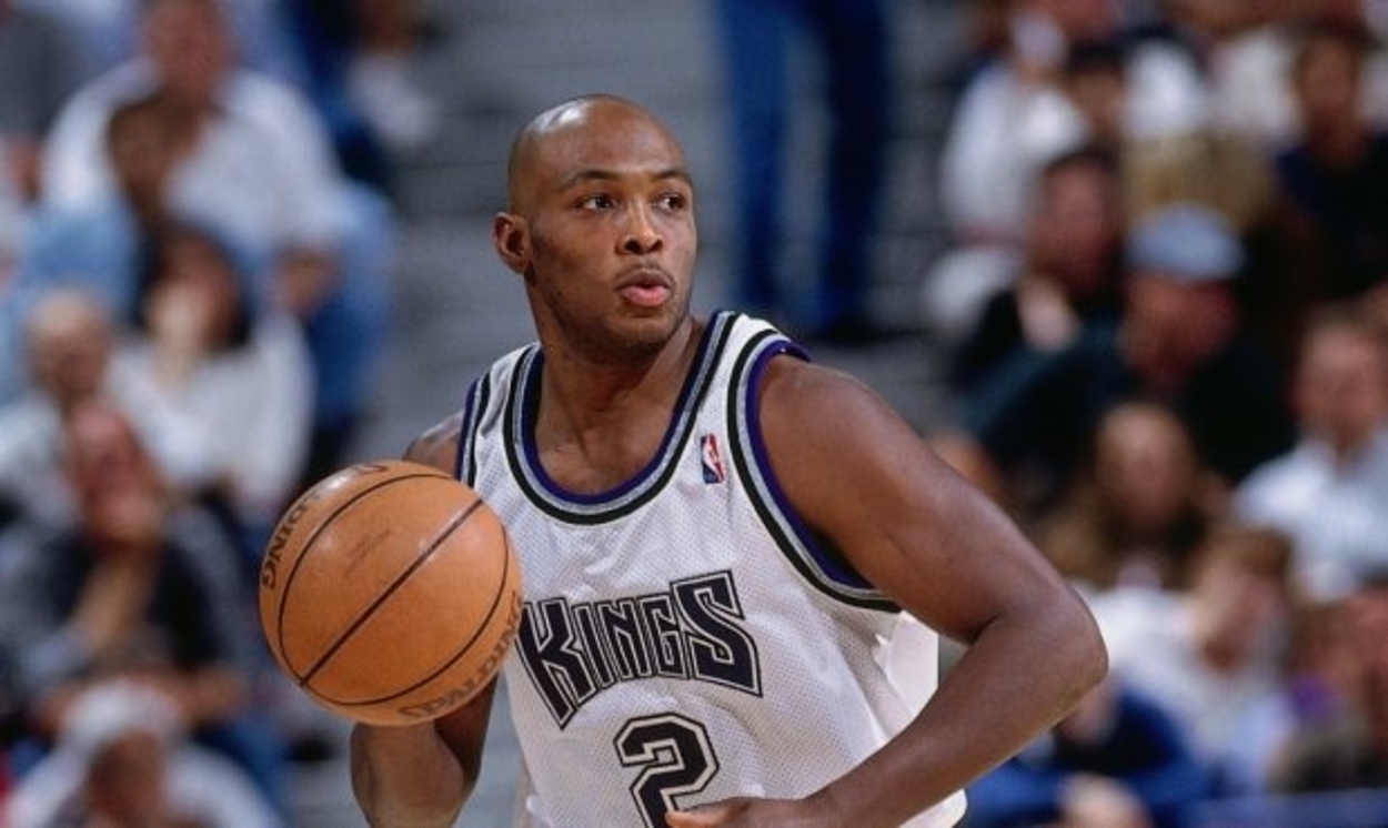 Mitch Richmond of the Sacramento Kings dribbles up the court.