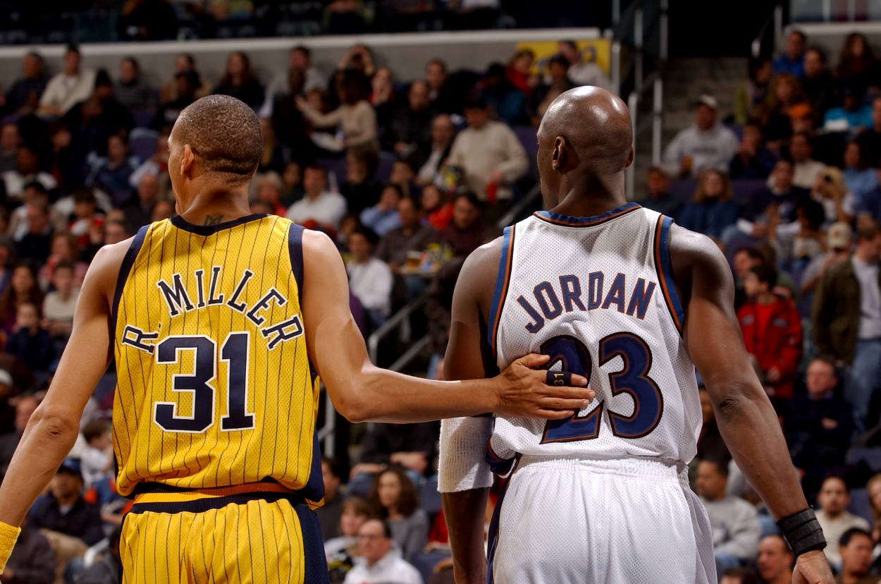 Reggie Miller of the Indiana Pacers guards Michael Jordan of the Washington Wizards.