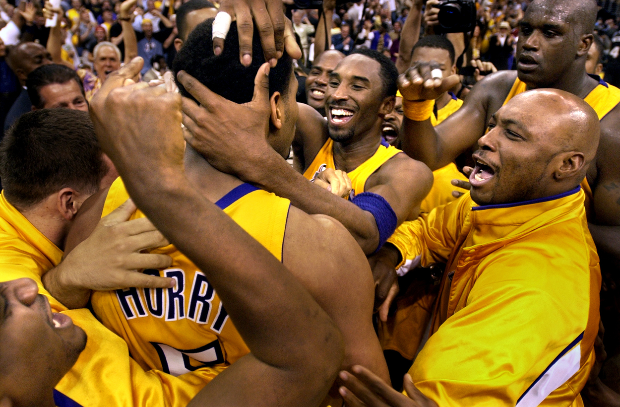 Robert Horry is embraced by his Lakers teammates after hitting the game-winning shot in Game 4 of the 2002 Western Conference Finals.
