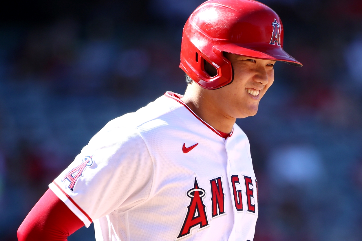 Shohei Ohtani of the Los Angeles Angels jogs to first base during the eighth inning of a game against the Texas Rangers.