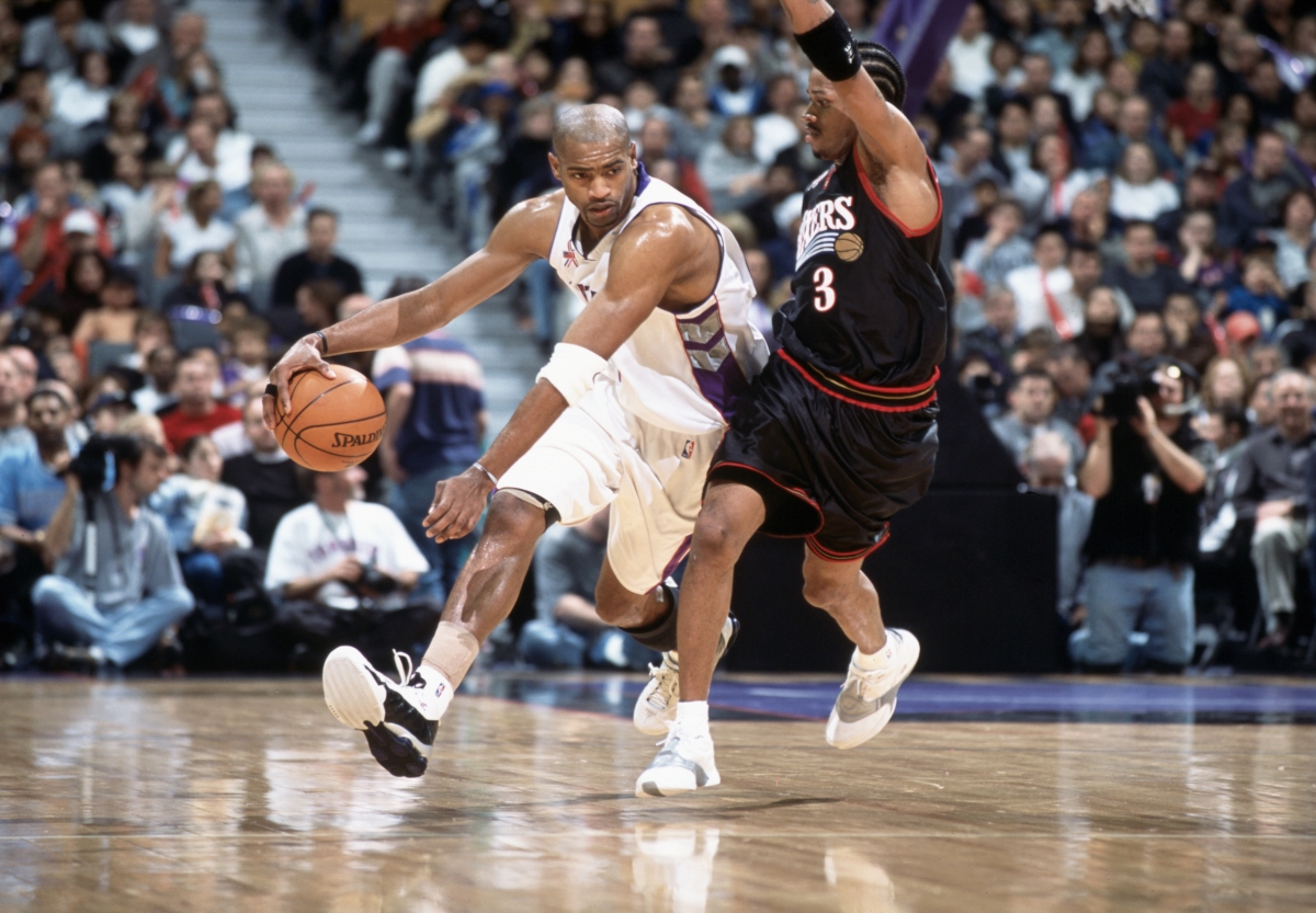 Vince Carter of the Toronto Raptors is guarded by Allen Iverson of the Philadelphia 76ers during a 2001 Eastern Conference semifinals game.