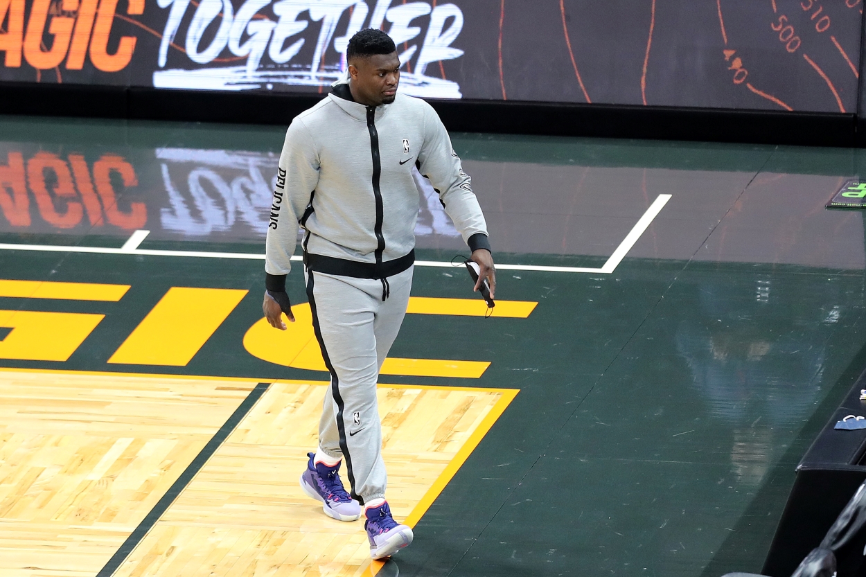 Zion Williamson of the New Orleans Pelicans walks off the court during warmups in a game against the Orlando Magic.