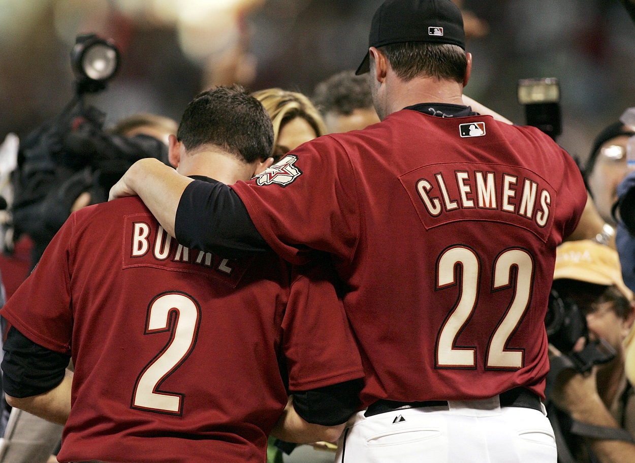 Chris Burke and Roger Clemens following the Houston Astros' 18-inning win over the Atlanta Braves in Game 4 of the 2005 NLDS