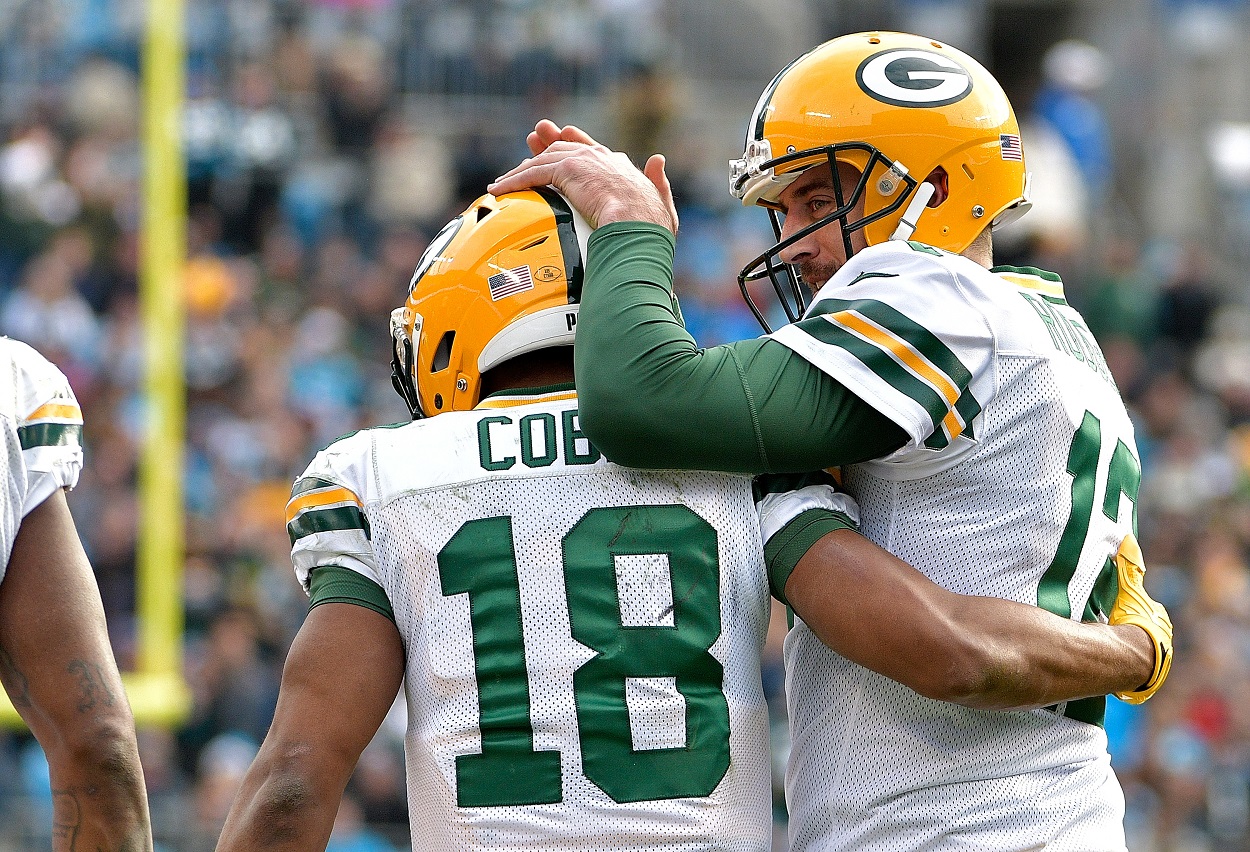 Aaron Rodgers and Randall Cobb of the Green Bay Packers celebrate a nice play