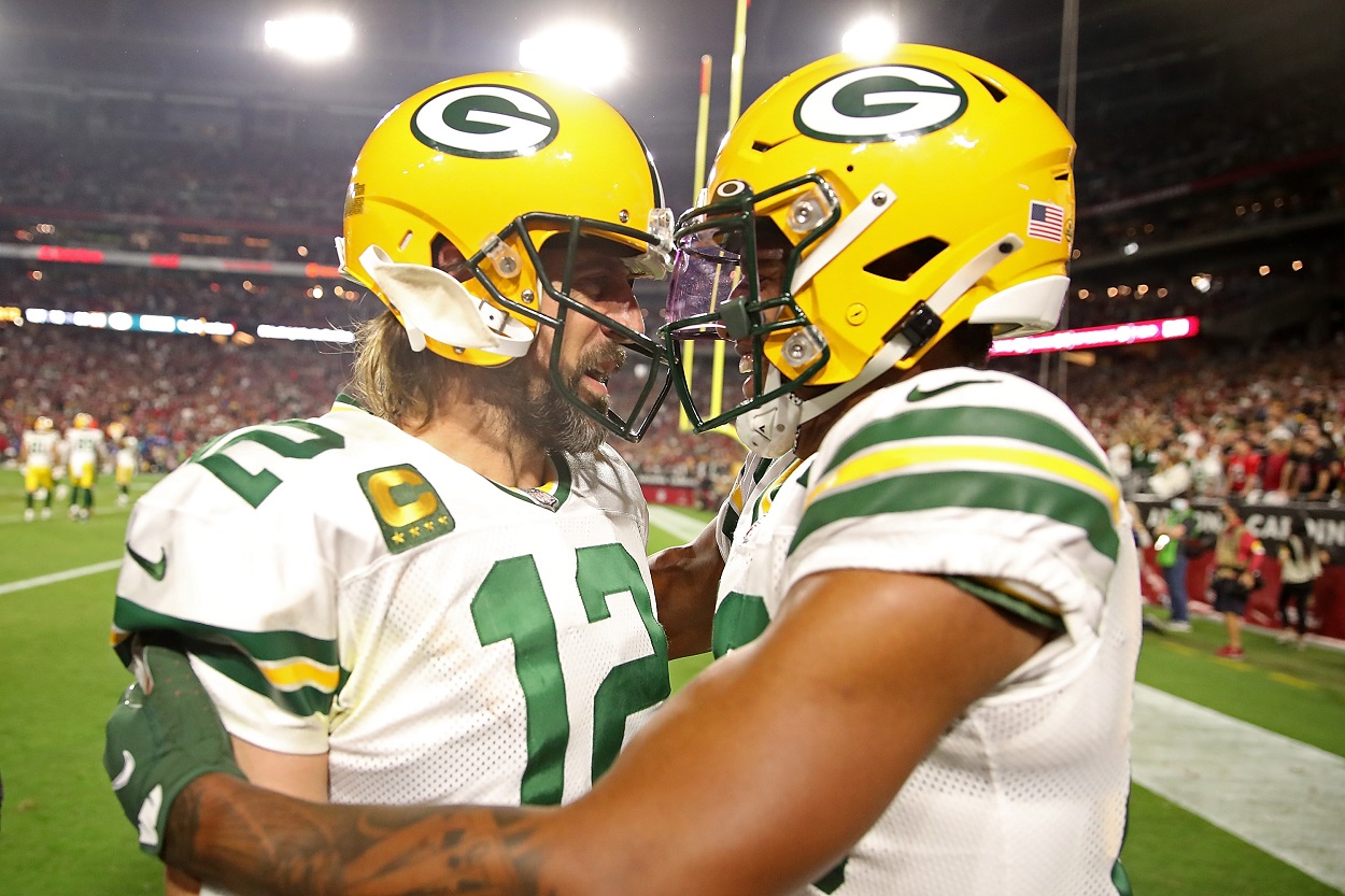 Aaron Rodgers and Rasul Douglas of the Green Bay Packers