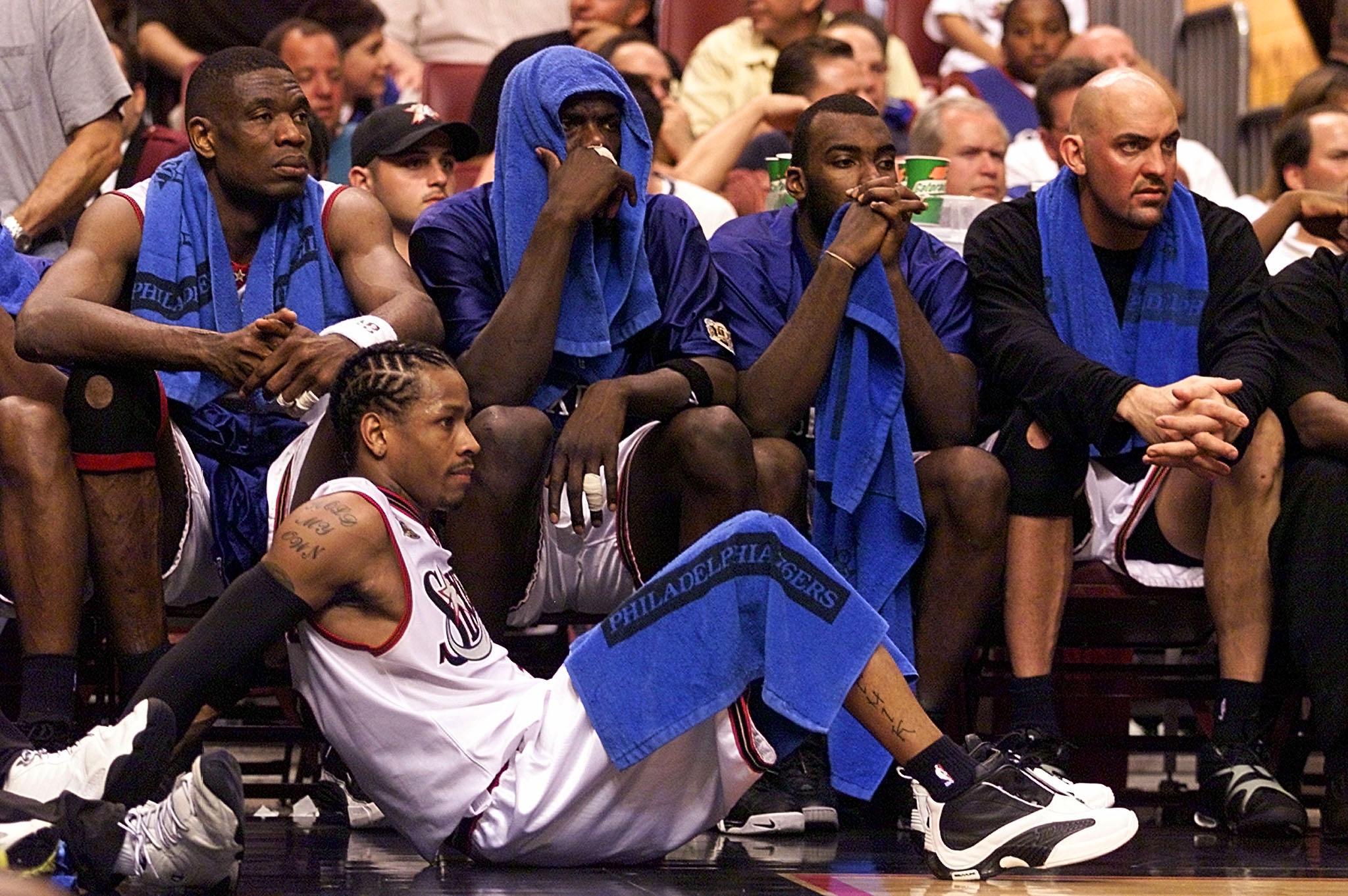 Allen Iverson and his Sixers teammates look on during Game 4 of the 2001 NBA Finals