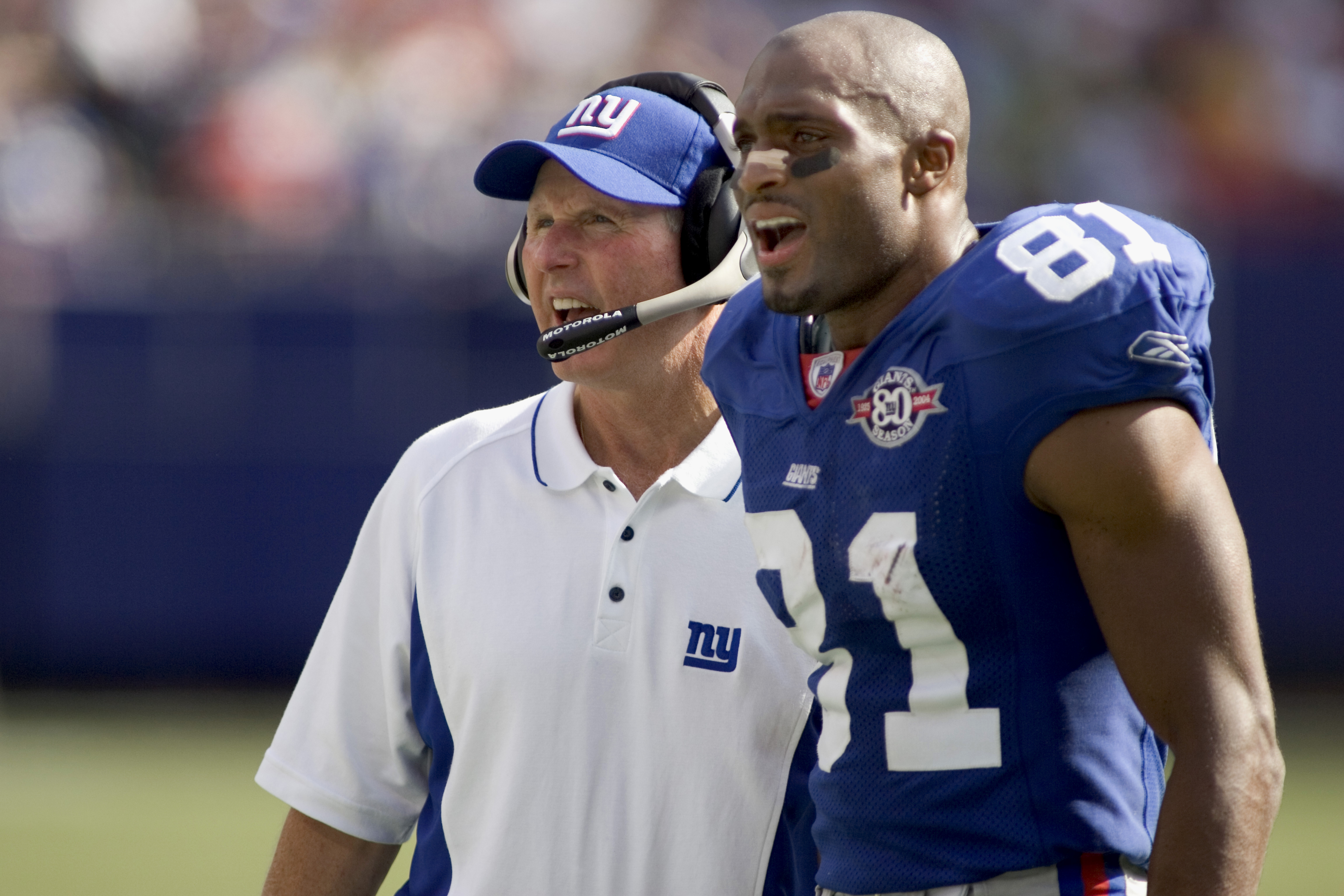 New York Giants wide receiver Amani Toomer talks to Tom Coughlin