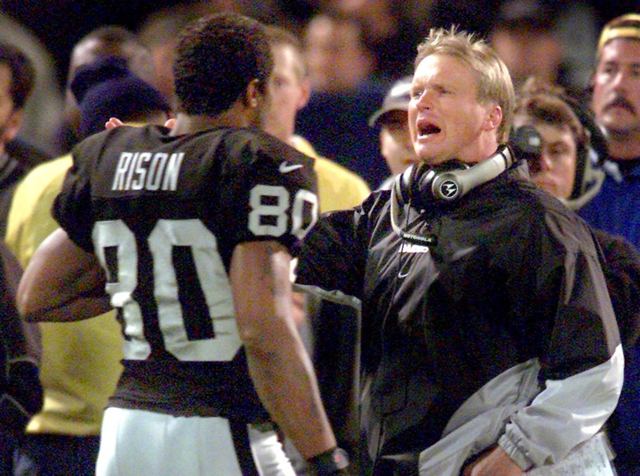 Oakland Raiders receiver Andre Rison (L) and Raiders head coach Jon Gruden in 2000.