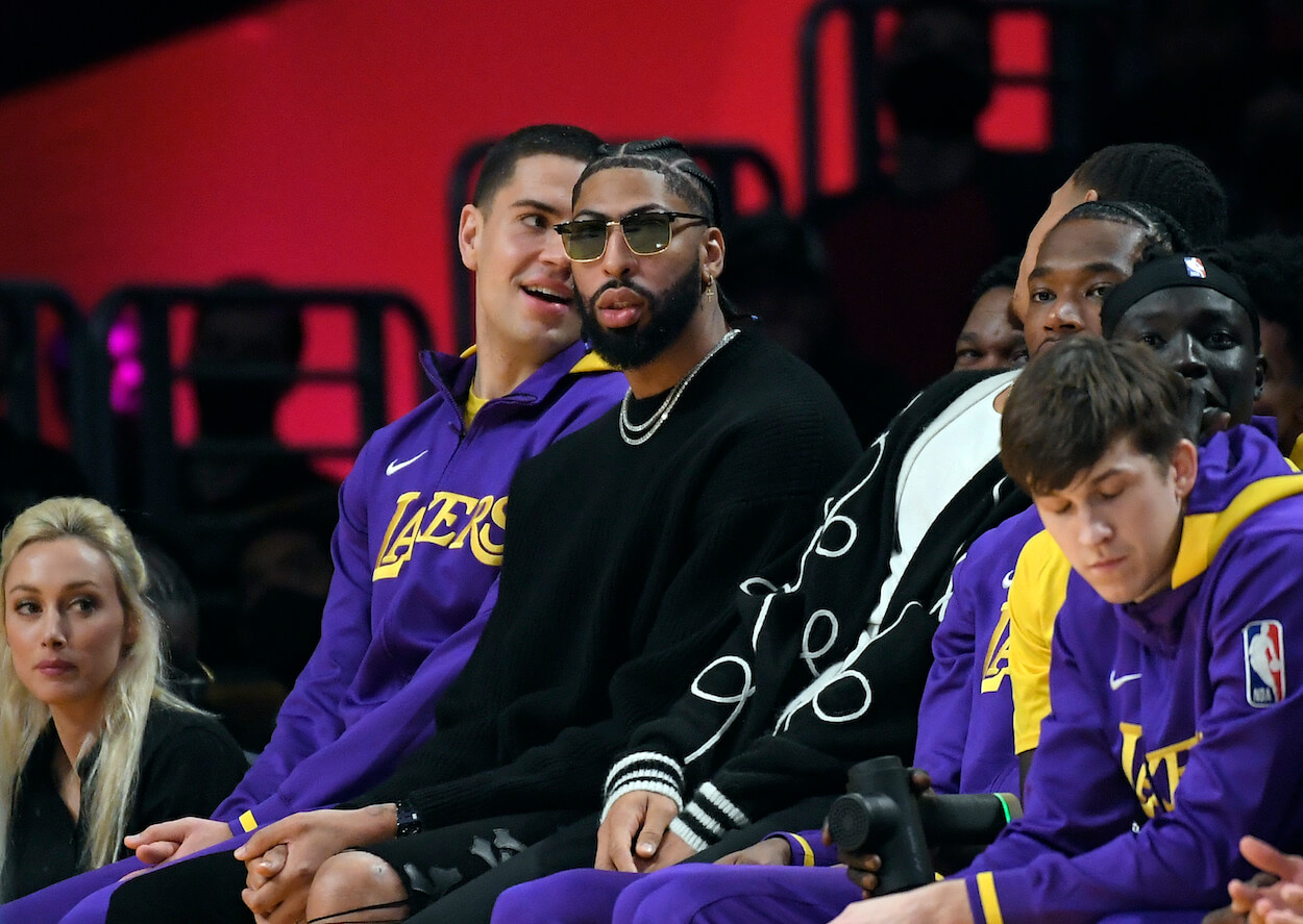 Anthony Davis looks on from the bench.