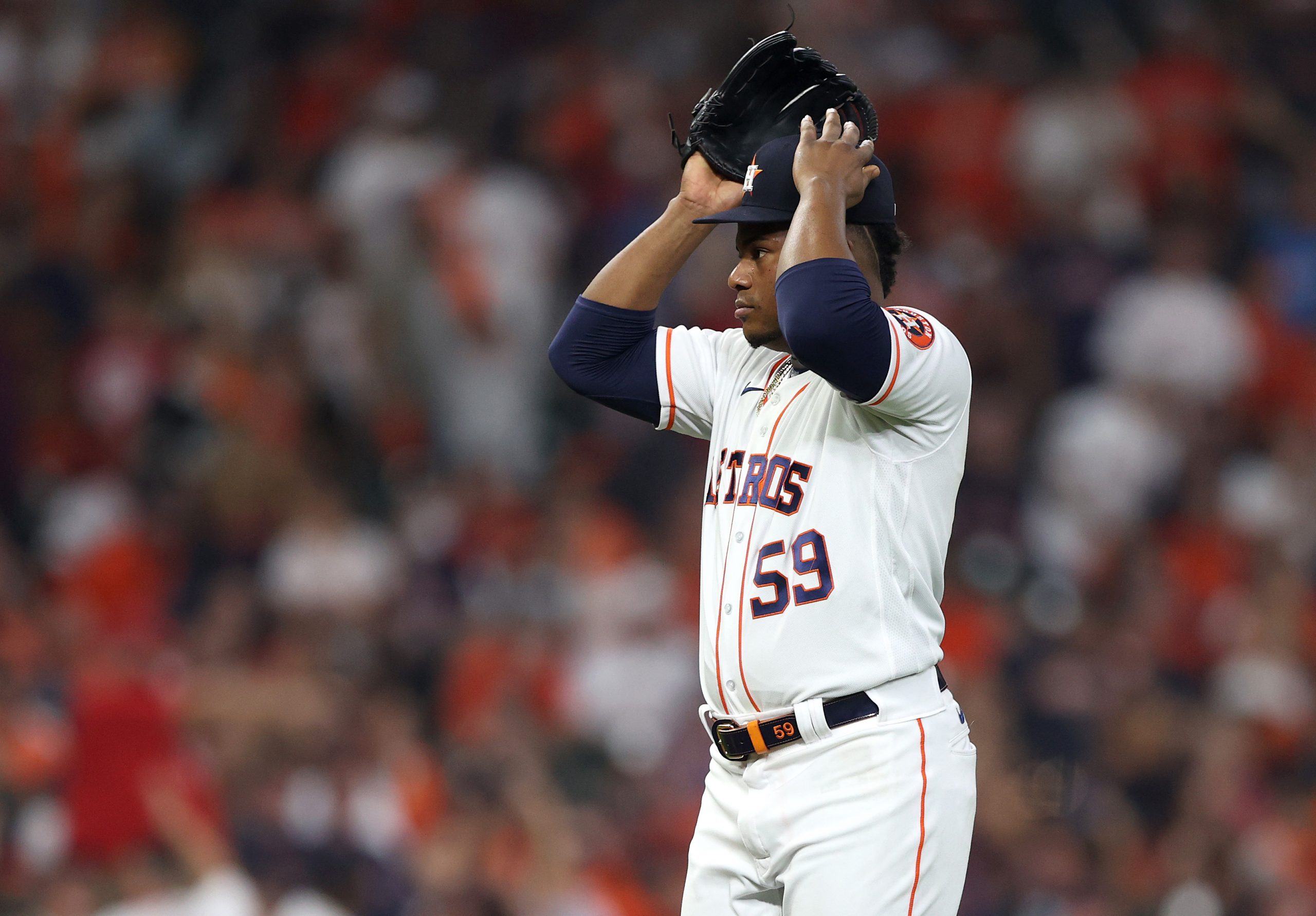 Framber Valdez of the Houston Astros reacts after he gave up a home run to Enrique Hernandez.