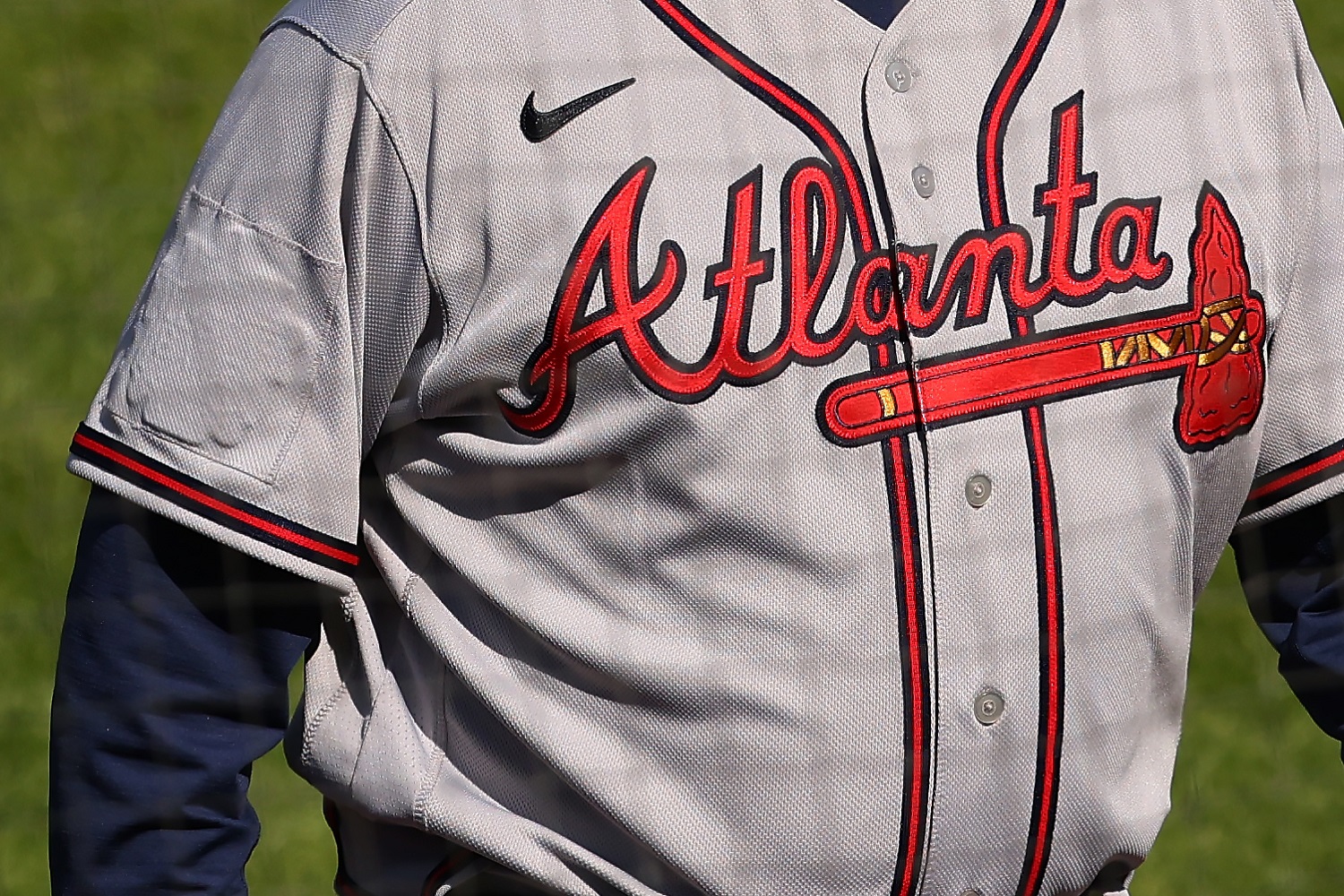 The All-Star Game logo is covered up on the right sleeve of manager Brian Snitker of the Atlanta Braves during a baseball game against the Philadelphia Phillies at Citizens Bank Park on April 4, 2021. | Rich Schultz/Getty Images