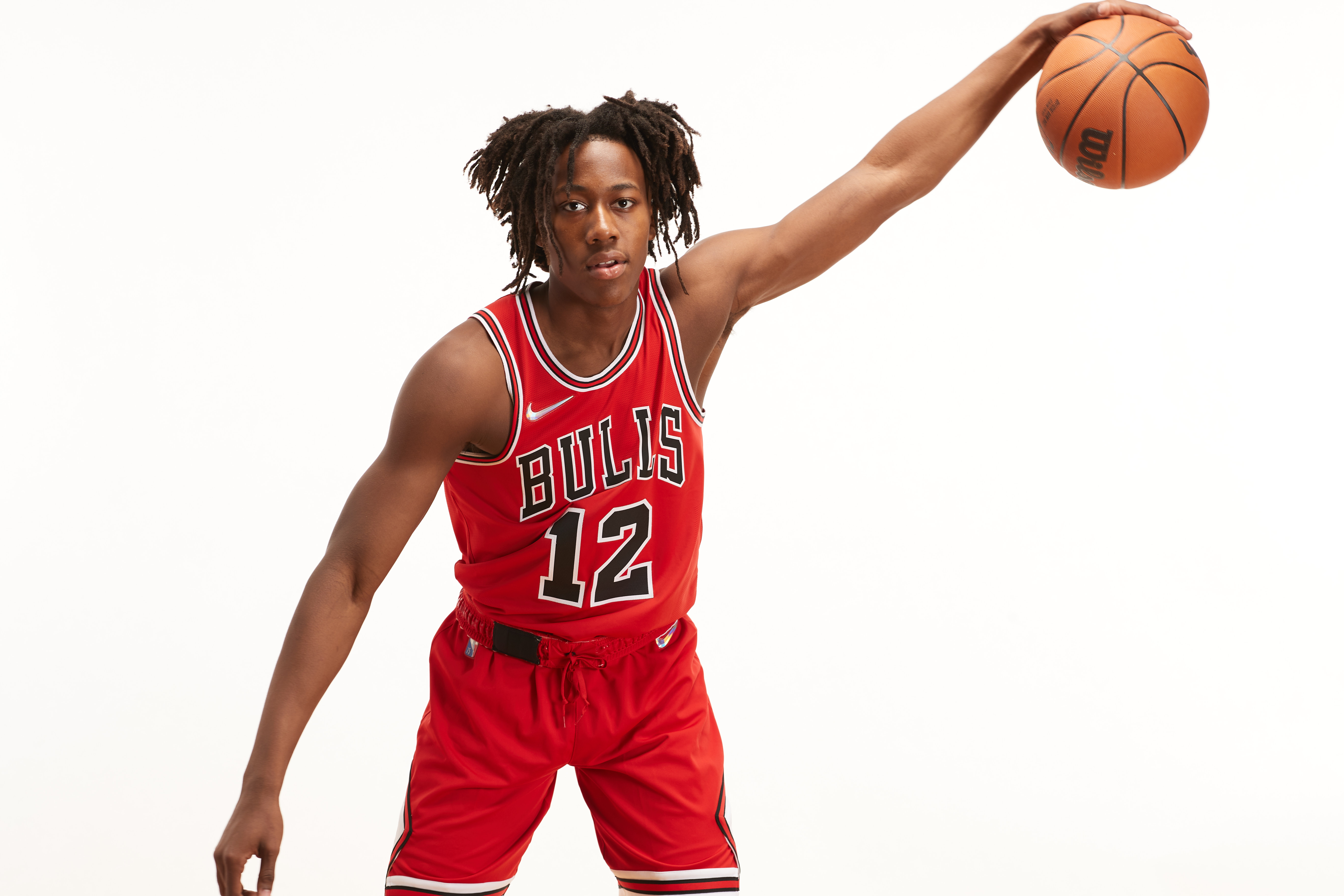 Bulls rookie Ayo Dosunmu poses during a photo shoot