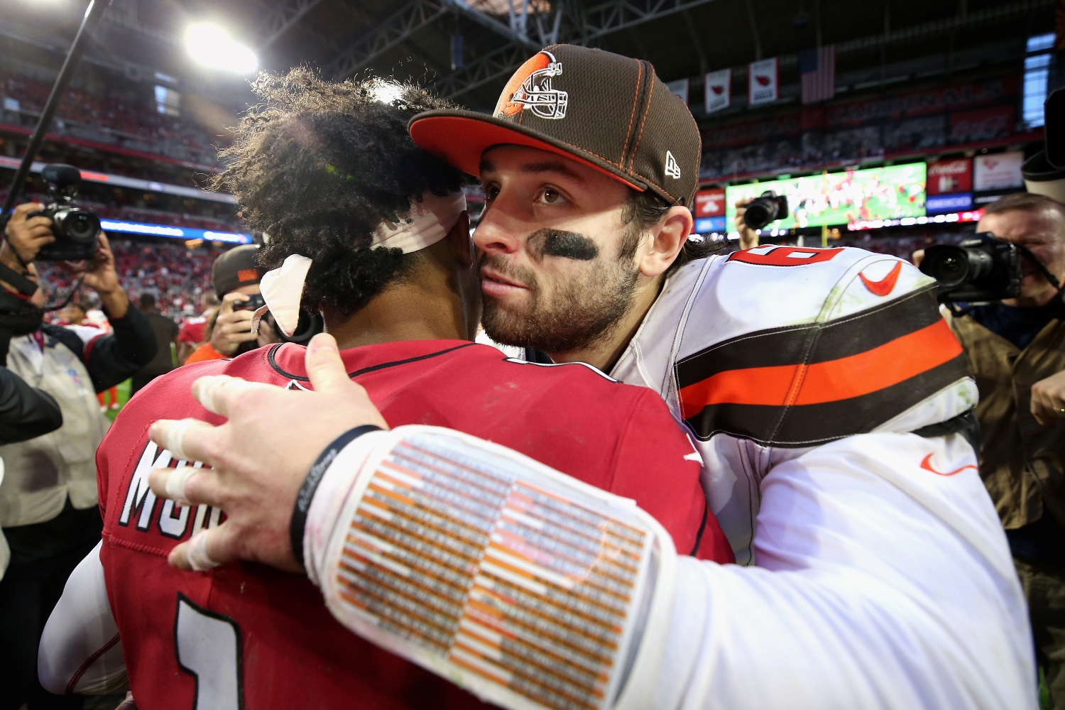 Cleveland Browns quarterback Baker Mayfield hugs Arizona Cardinals quarterback Kyler Murray after a game.