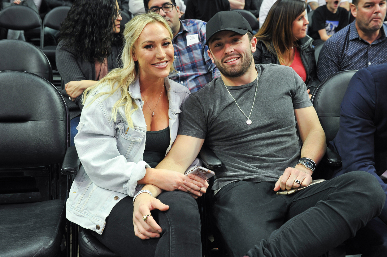 Cleveland Browns quarterback Baker Mayfield and his wife Emily at an NBA game in 2018.