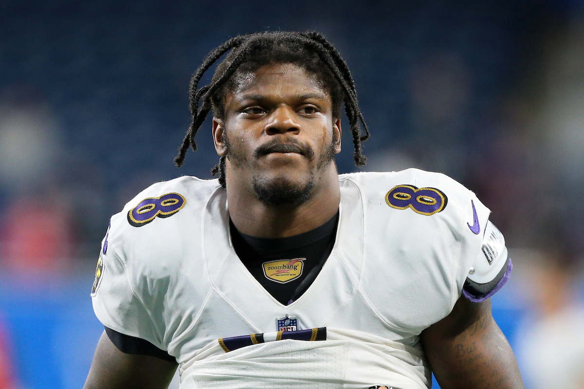 Baltimore Ravens quarterback Lamar Jackson walks off the field after a game
