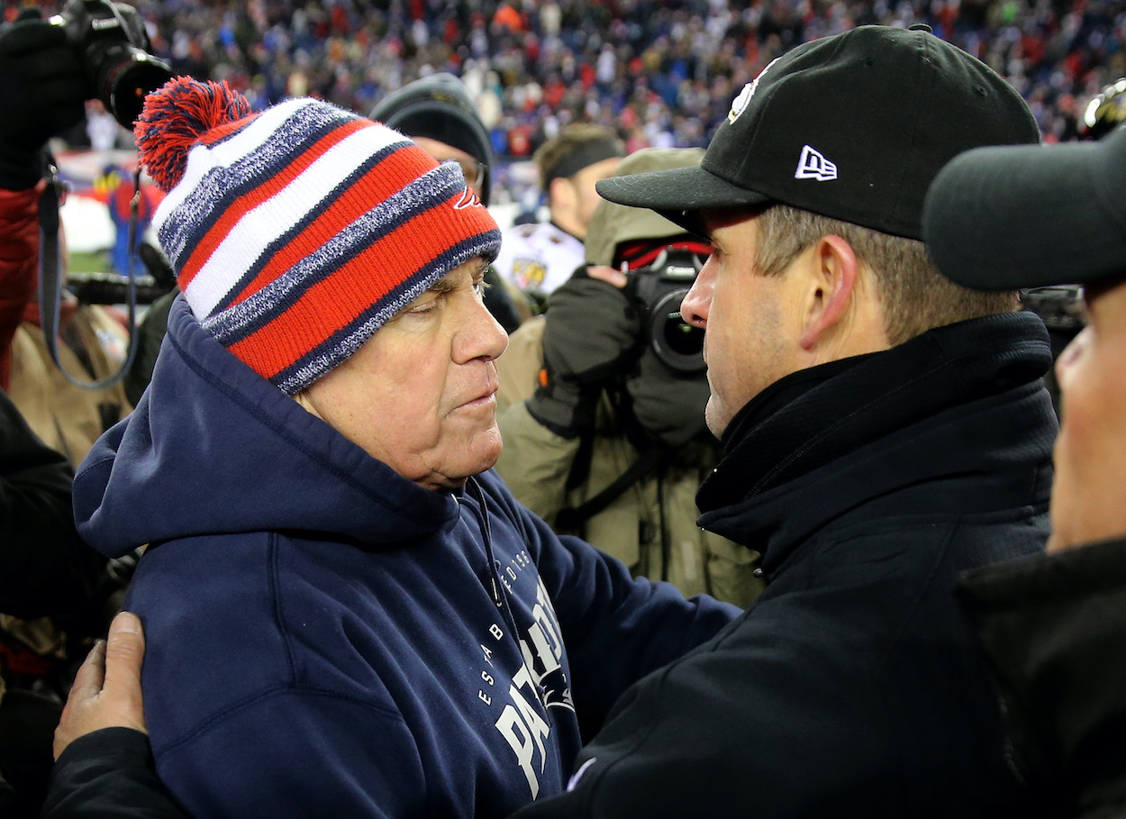 Head coaches Bill Belichick of the New England Patriots and John Harbaugh of the Baltimore Ravens shake hands following the 2015 AFC Divisional Playoffs game at Gillette Stadium on January 10, 2015 in Foxboro, Massachusetts.