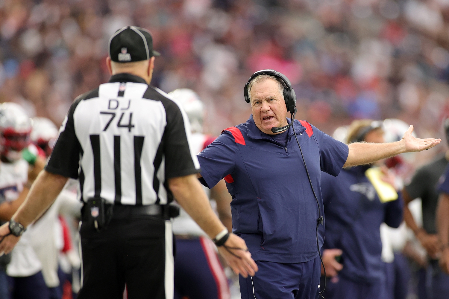 New England Patriots head coach Bill Belichick reacts to a call during a game.