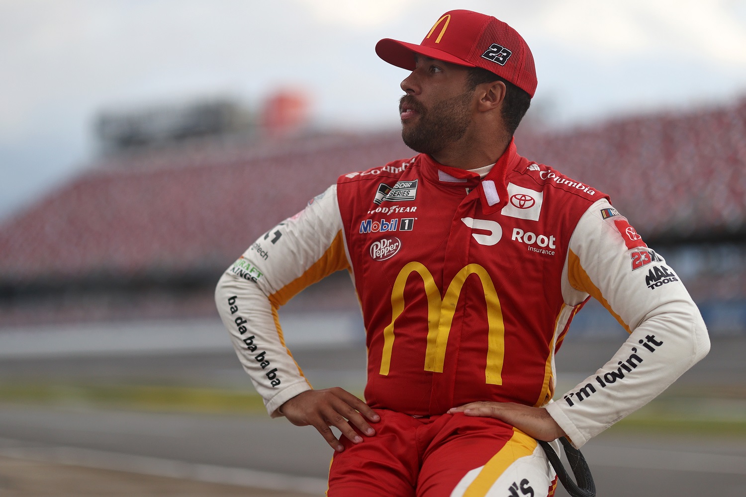 Bubba Wallace, driver of the No. 23 Toyota, waits prior to victory lane ceremonies after winning the rain-shortened NASCAR Cup Series YellaWood 500 at Talladega Superspeedway on Oct. 4, 2021.