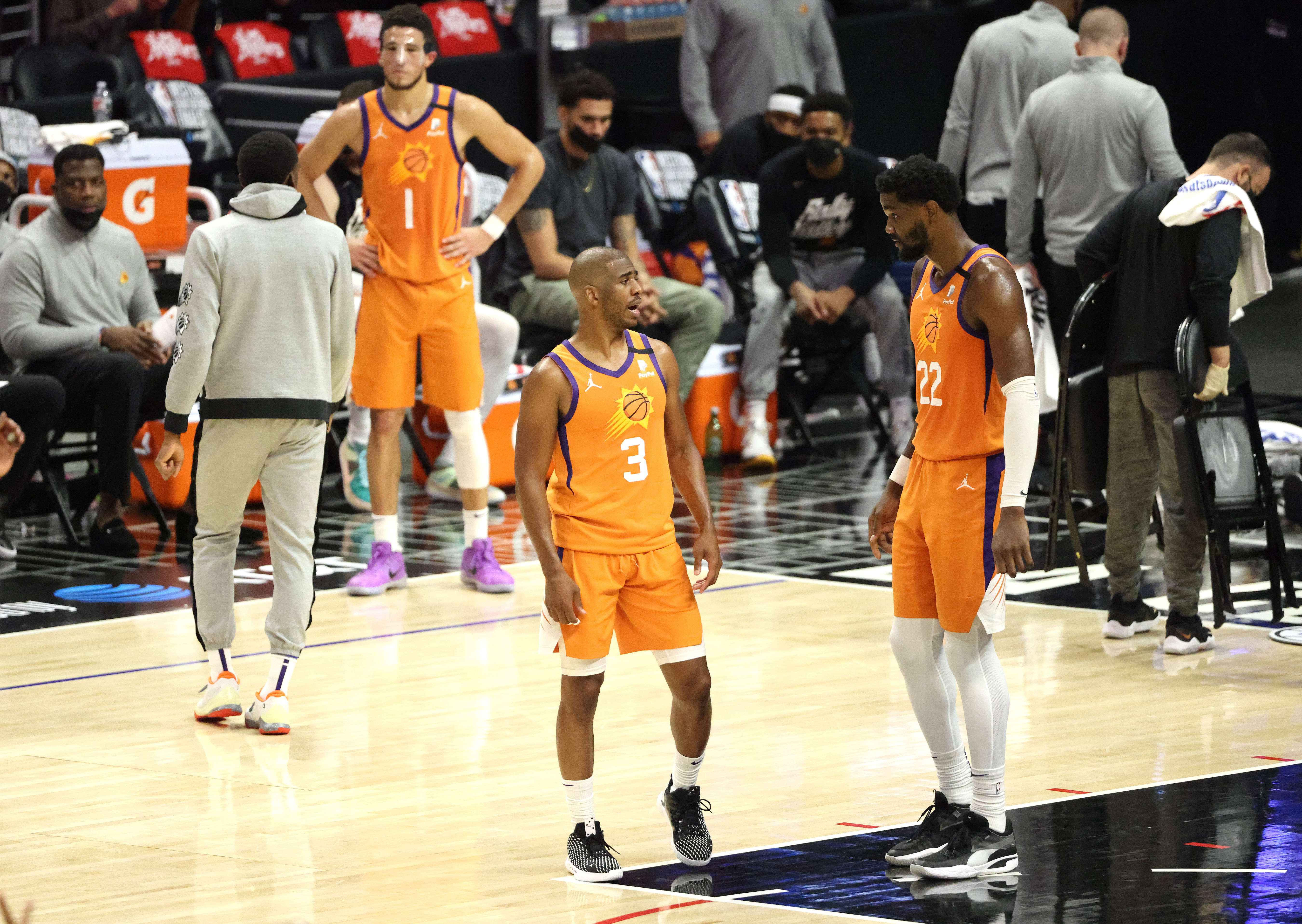 Suns teammates Chris Paul and Deandre Ayton talk during the 2021 NBA Playoffs