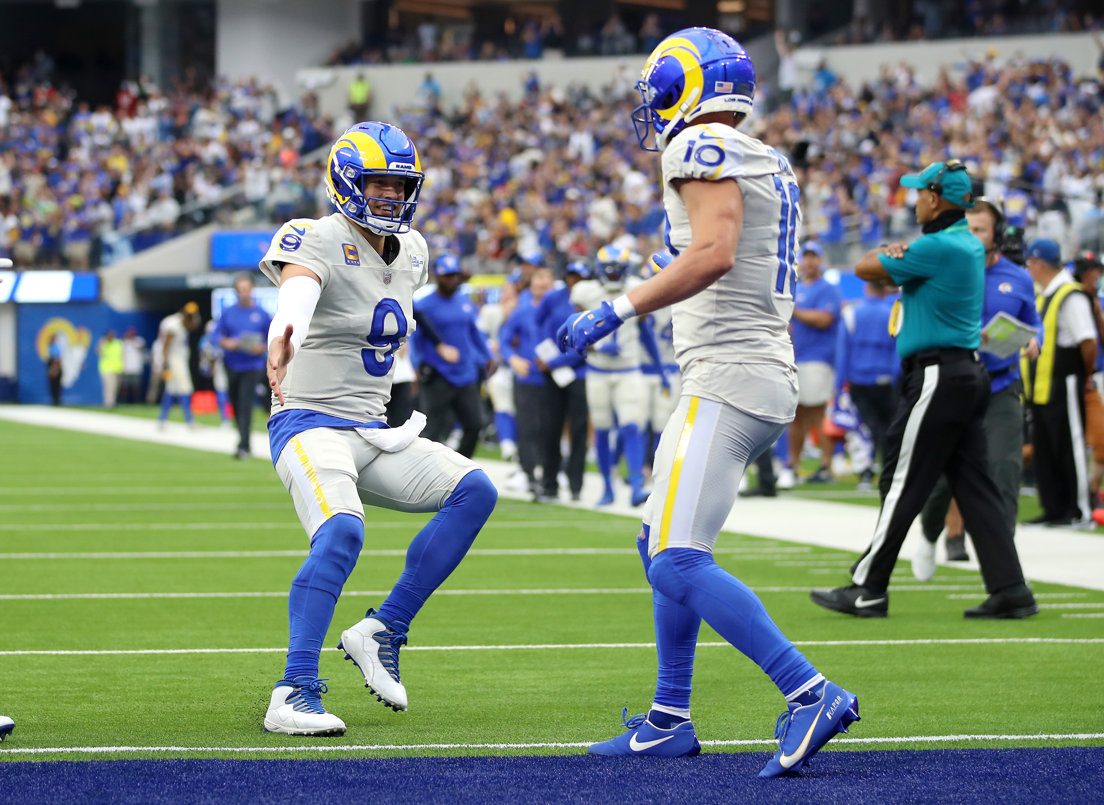 Rams quarterback Matthew Stafford celebrates with Cooper Kupp after a touchdown