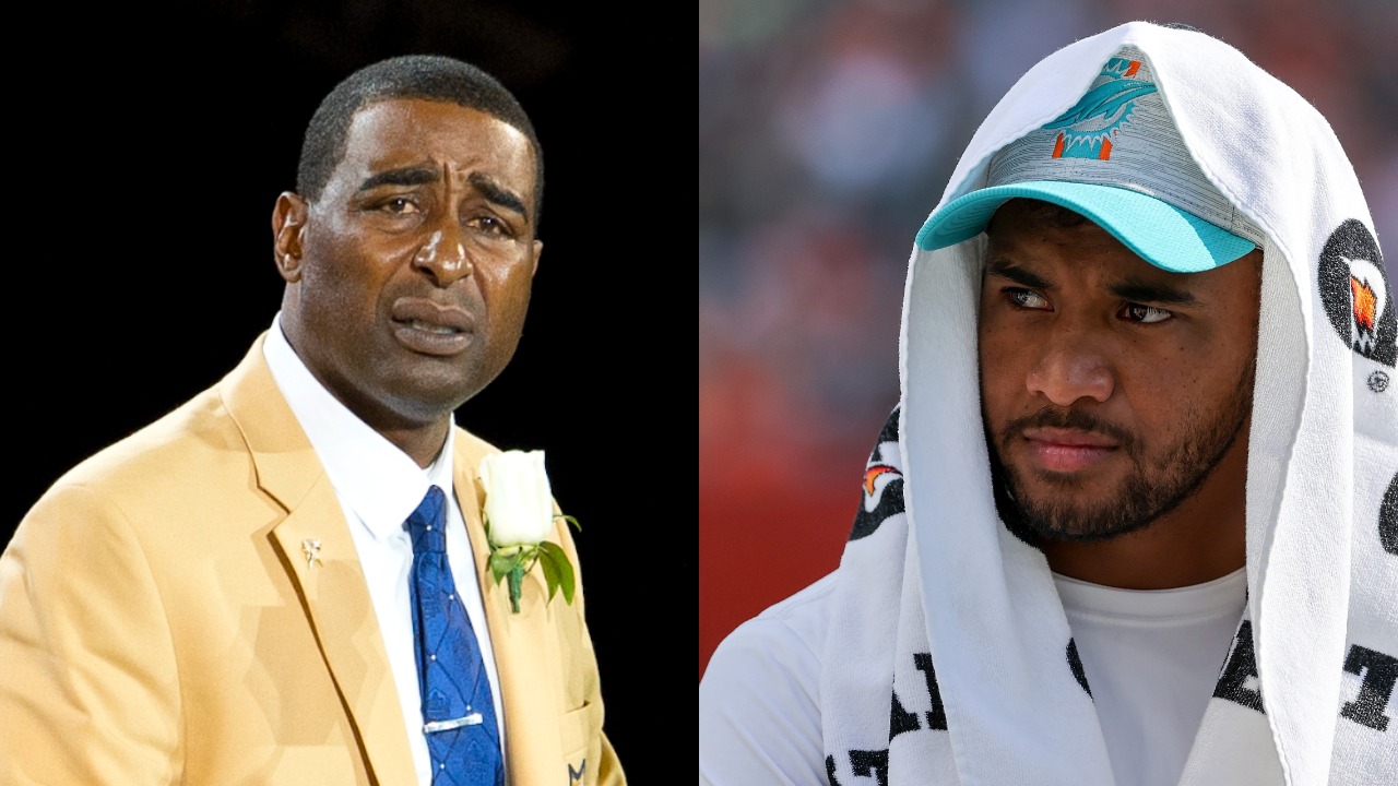 Cris Carter giving his Hall of Fame speech; Dolphins QB Tua Tagovailoa looks on from the sideline