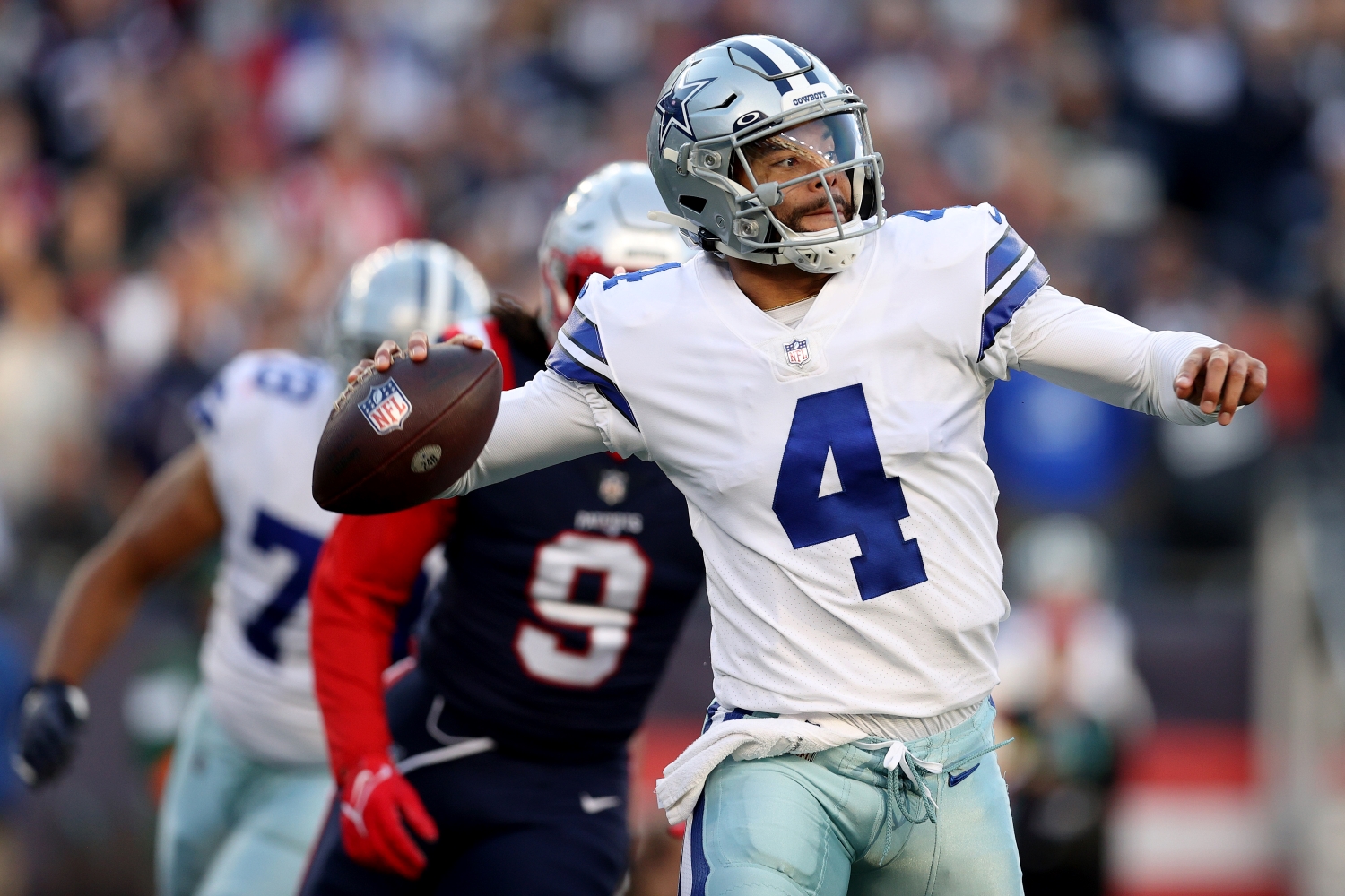 Dallas Cowboys QB Dak Prescott throws a pass against the New England Patriots.