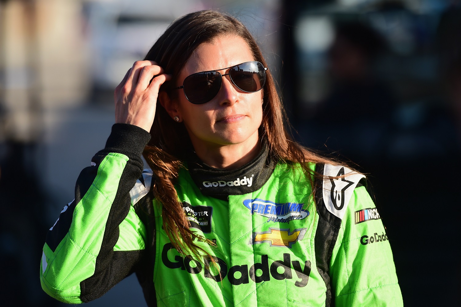 Danica Patrick, driver of the GoDaddy Chevrolet, walks from the infield care center after being involved in an on-track incident during the Daytona 500 at Daytona International Speedway on Feb. 18, 2018.