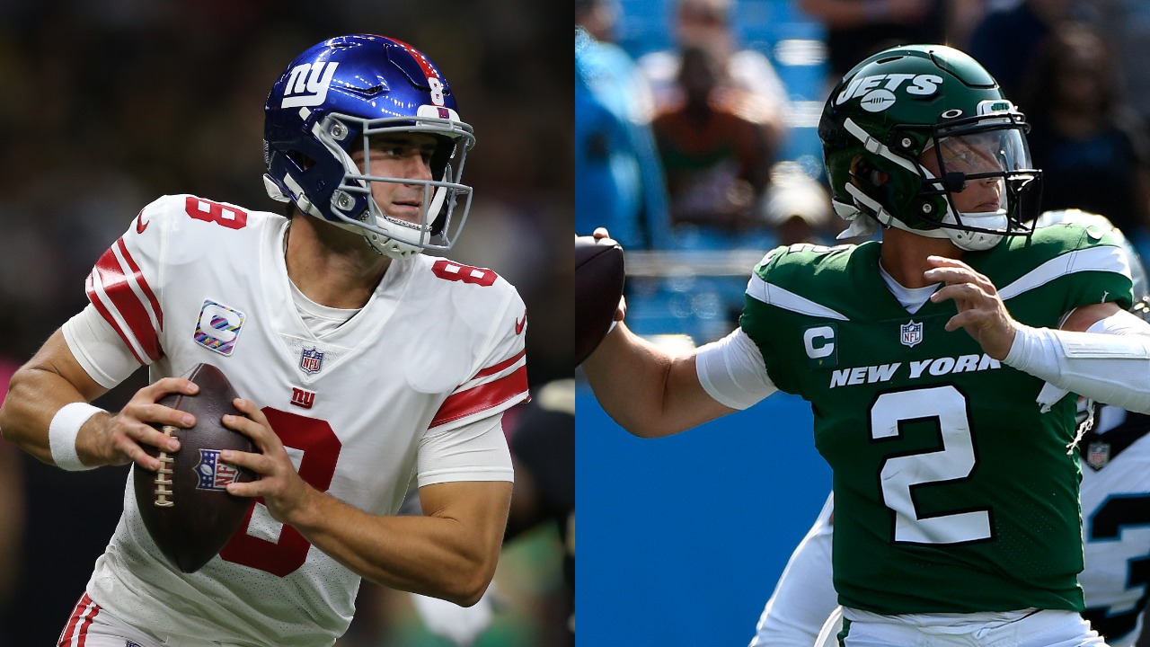 Giants QB Daniel Jones in action; Jets QB Zach Wilson in action