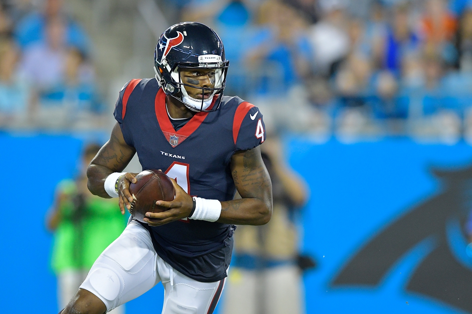 Houston Texans quarterback Deshaun Watson looks to make a pass against the Carolina Panthers.