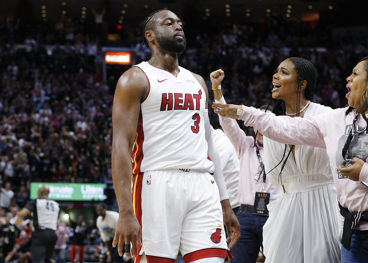 Miami Heat legend Dwyane Wade celebrating with his wife Gabrielle Union in 2019.