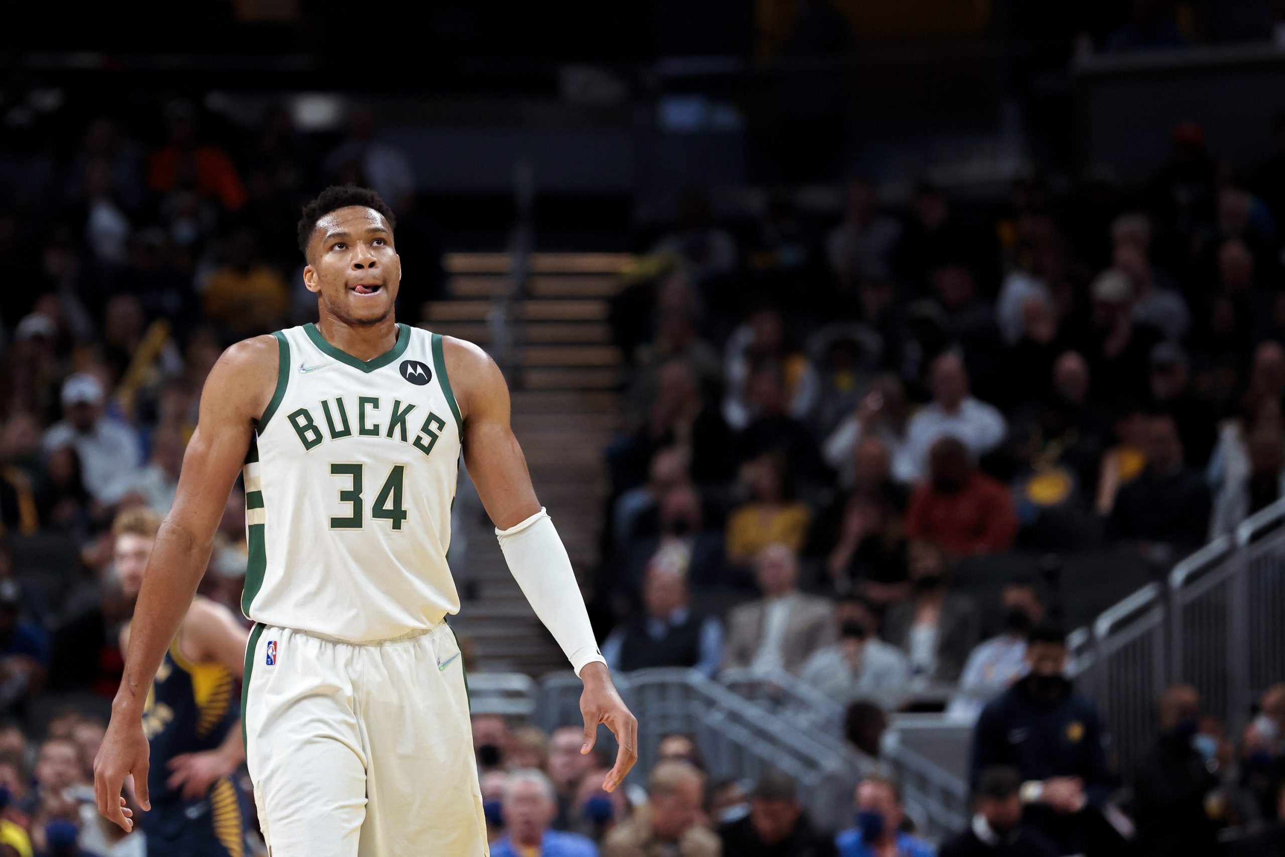 Giannis Antetokounmpo of the Milwaukee Bucks walks across the court.