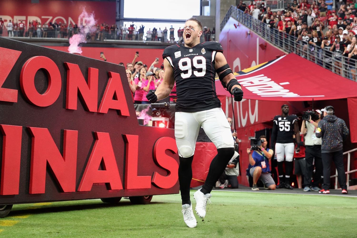 J.J. Watt of the Arizona Cardinals runs onto the field before a game against the San Francisco 49ers.