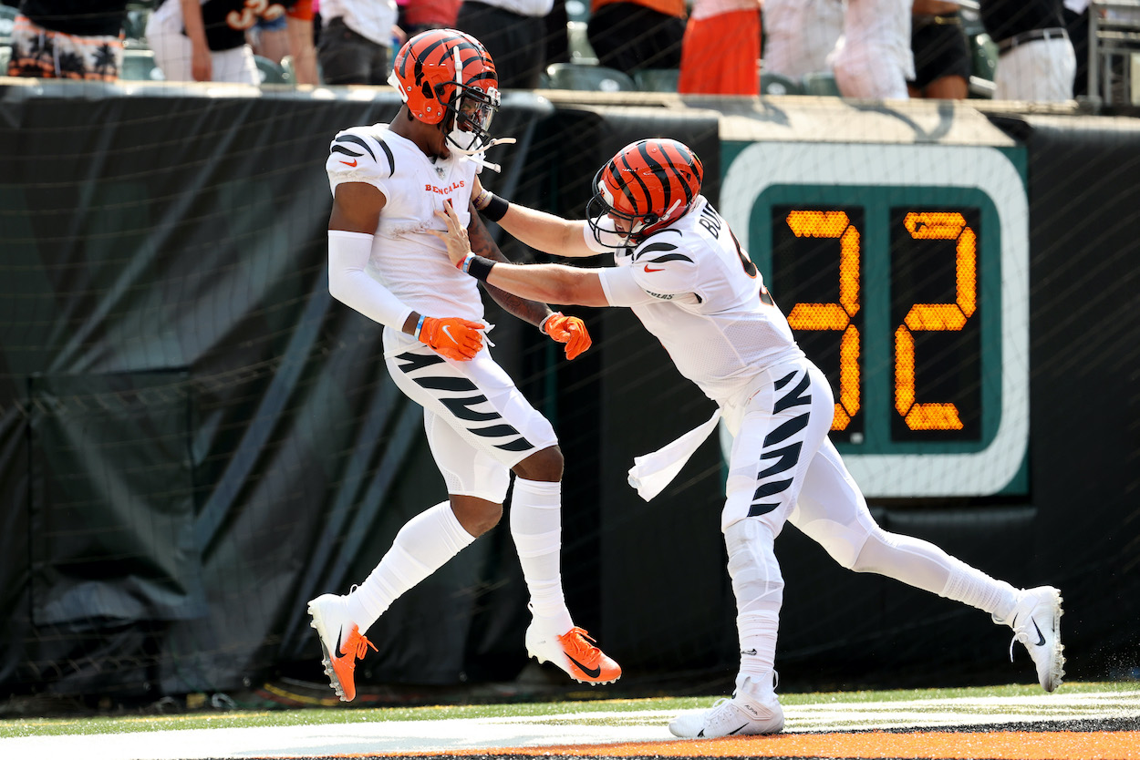 Ja'Marr Chase of the Cincinnati Bengals celebrates with Joe Burrow after a 50-yard touchdown reception during the second quarter against the Minnesota Vikings at Paul Brown Stadium on September 12, 2021 in Cincinnati, Ohio.