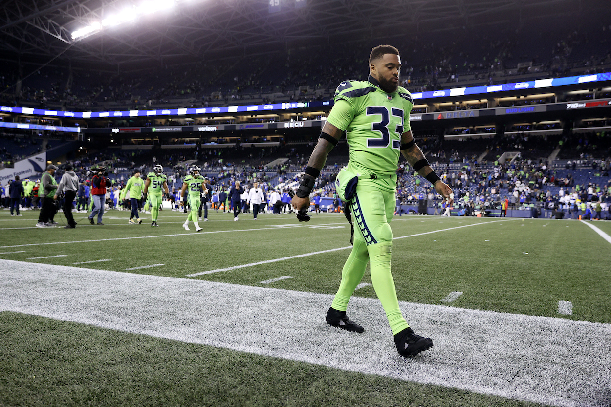 Jamal Adams of the Seattle Seahawks walks off the field after losing to the Los Angeles Rams 26-17 at Lumen Field on October 07, 2021 in Seattle, Washington.