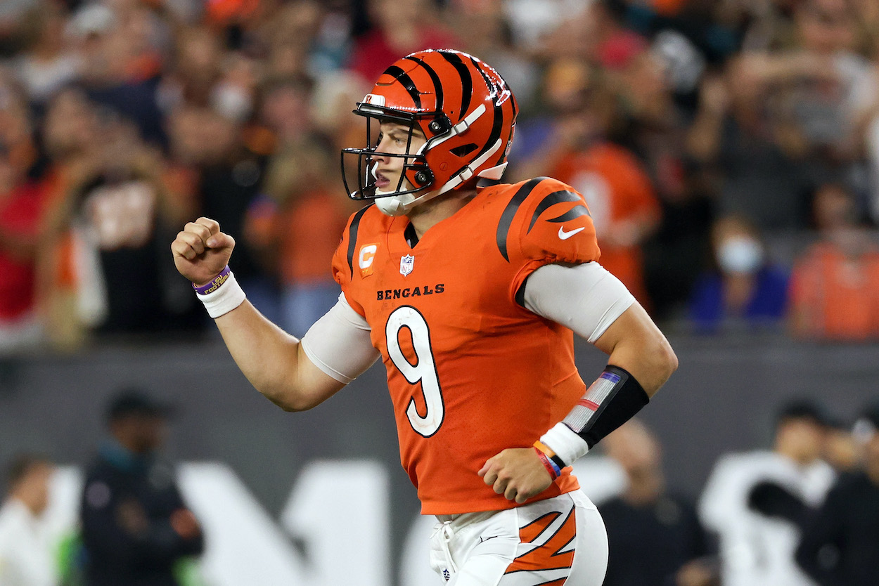 Joe Burrow of the Cincinnati Bengals, who faces the Green Bay Packers in NFL Week 5, celebrates after scoring a touchdown in the fourth quarter against the Jacksonville Jaguars at Paul Brown Stadium on September 30, 2021 in Cincinnati, Ohio.