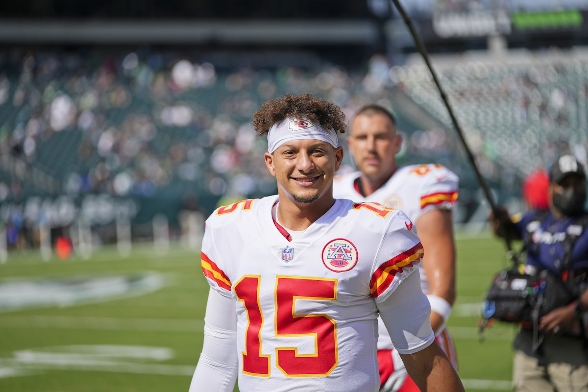 Kansas City Chiefs quarterback Patrick Mahomes smiles on the sideline