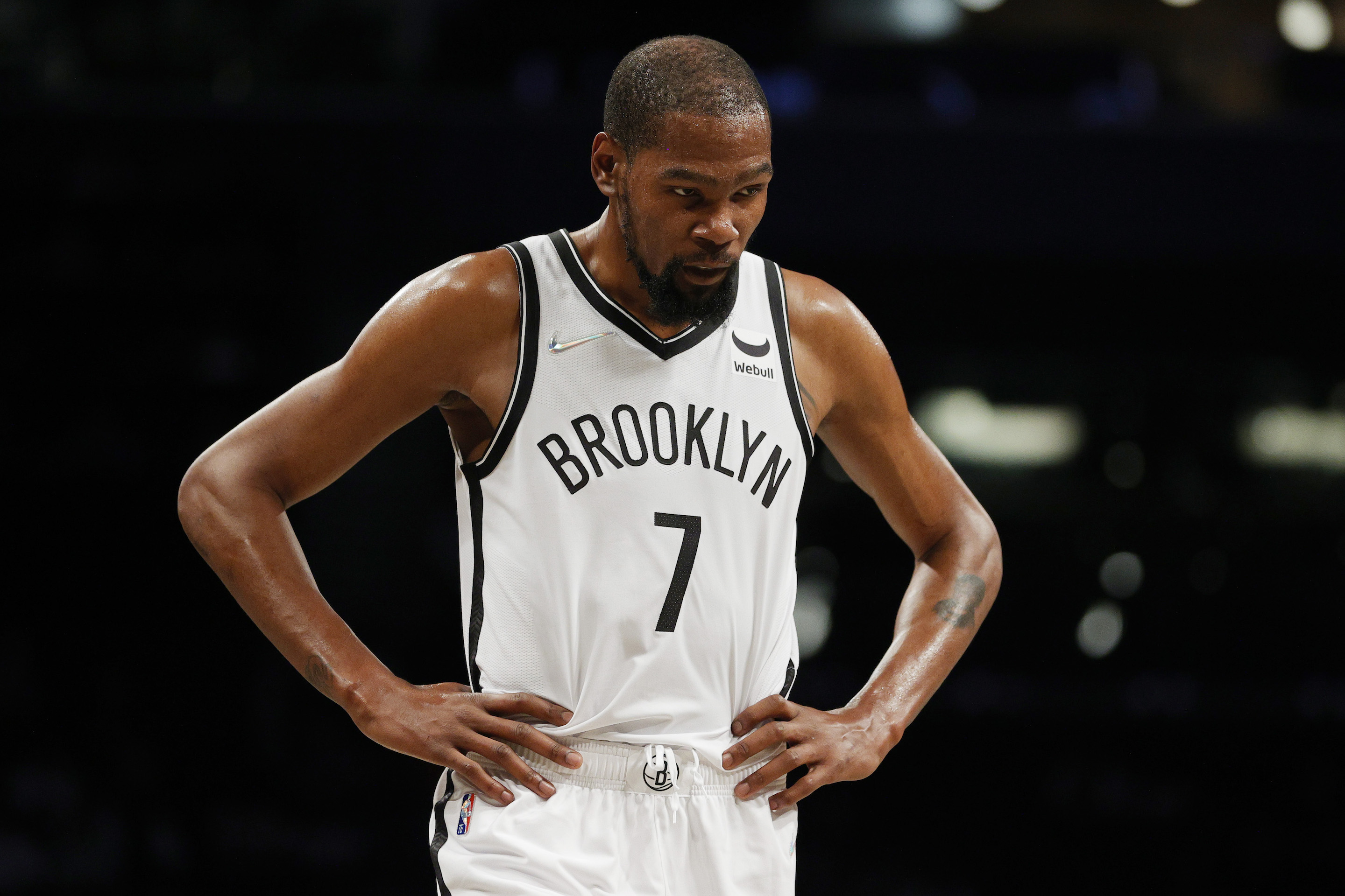 Brooklyn Nets star Kevin Durant looks on during an NBA preseason game
