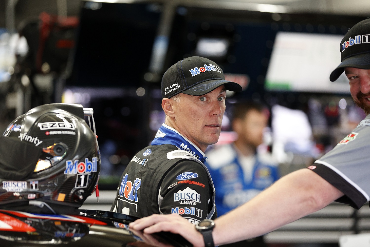 Kevin Harvick, driver of the No. 4 Ford, waits in the garage area during practice for the NASCAR Cup Series Coca-Cola 600 at Charlotte Motor Speedway on May 28, 2021.