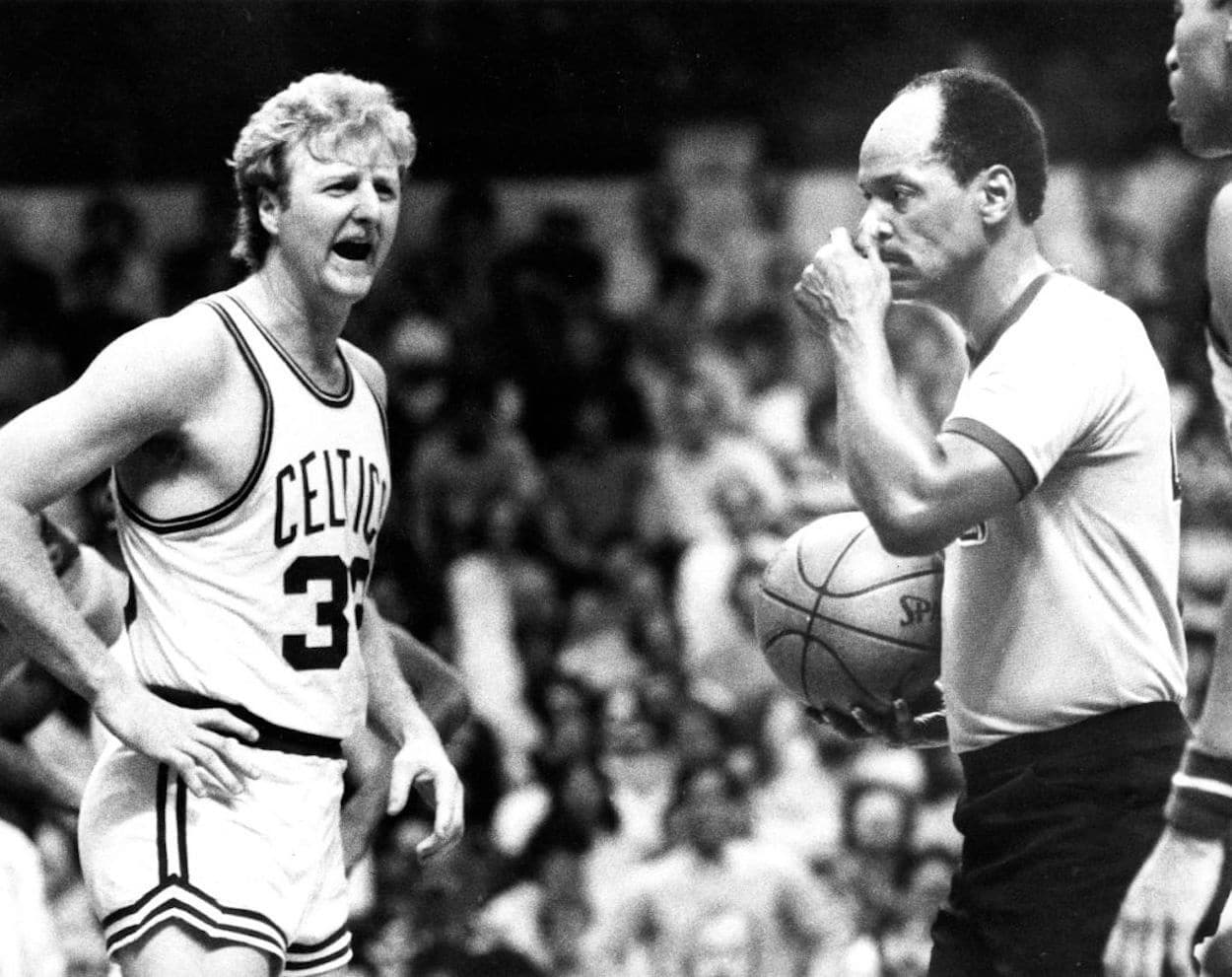 Larry Bird (L) reacts to a call during the 1984 NBA Finals.