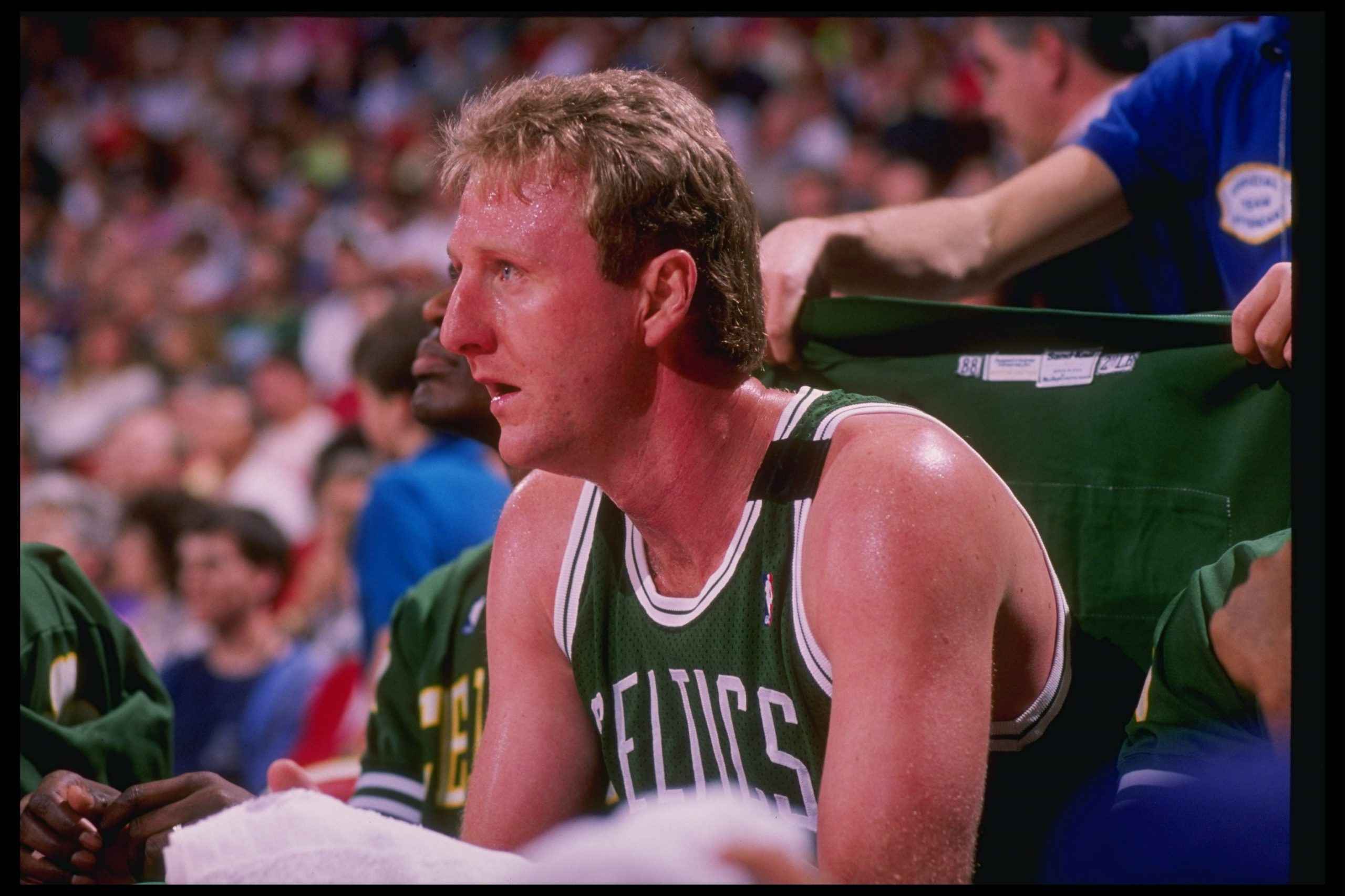Forward Larry Bird of the Boston Celtics sits on the bench.