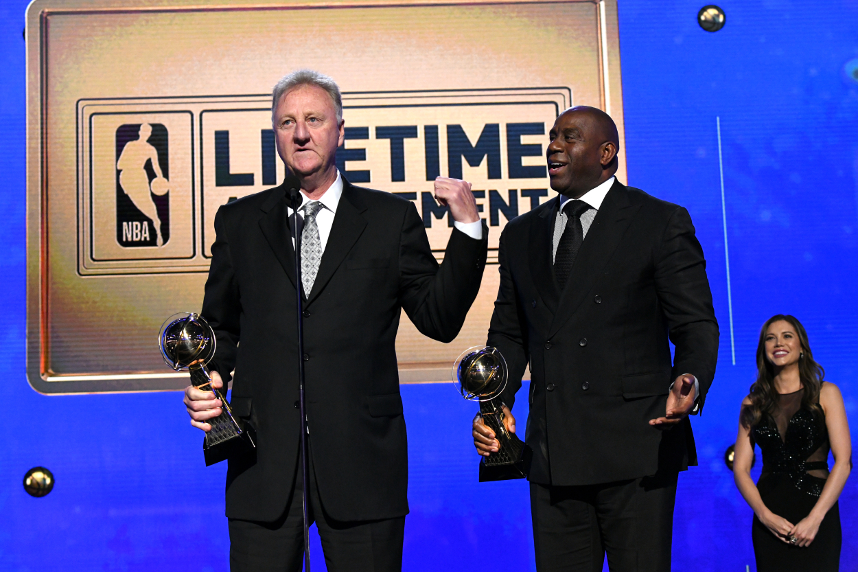 Larry Bird and Magic Johnson accept the Lifetime Achievement Awards onstage during the 2019 NBA Awards.