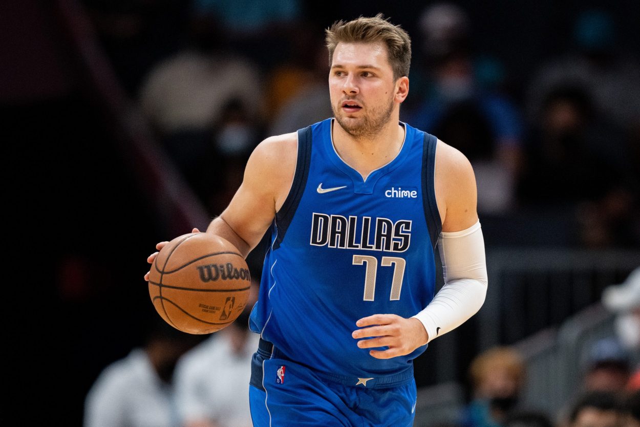 Dallas Mavericks star Luka Doncic dribbles up the floor during a preseason game against the Charlotte Hornets